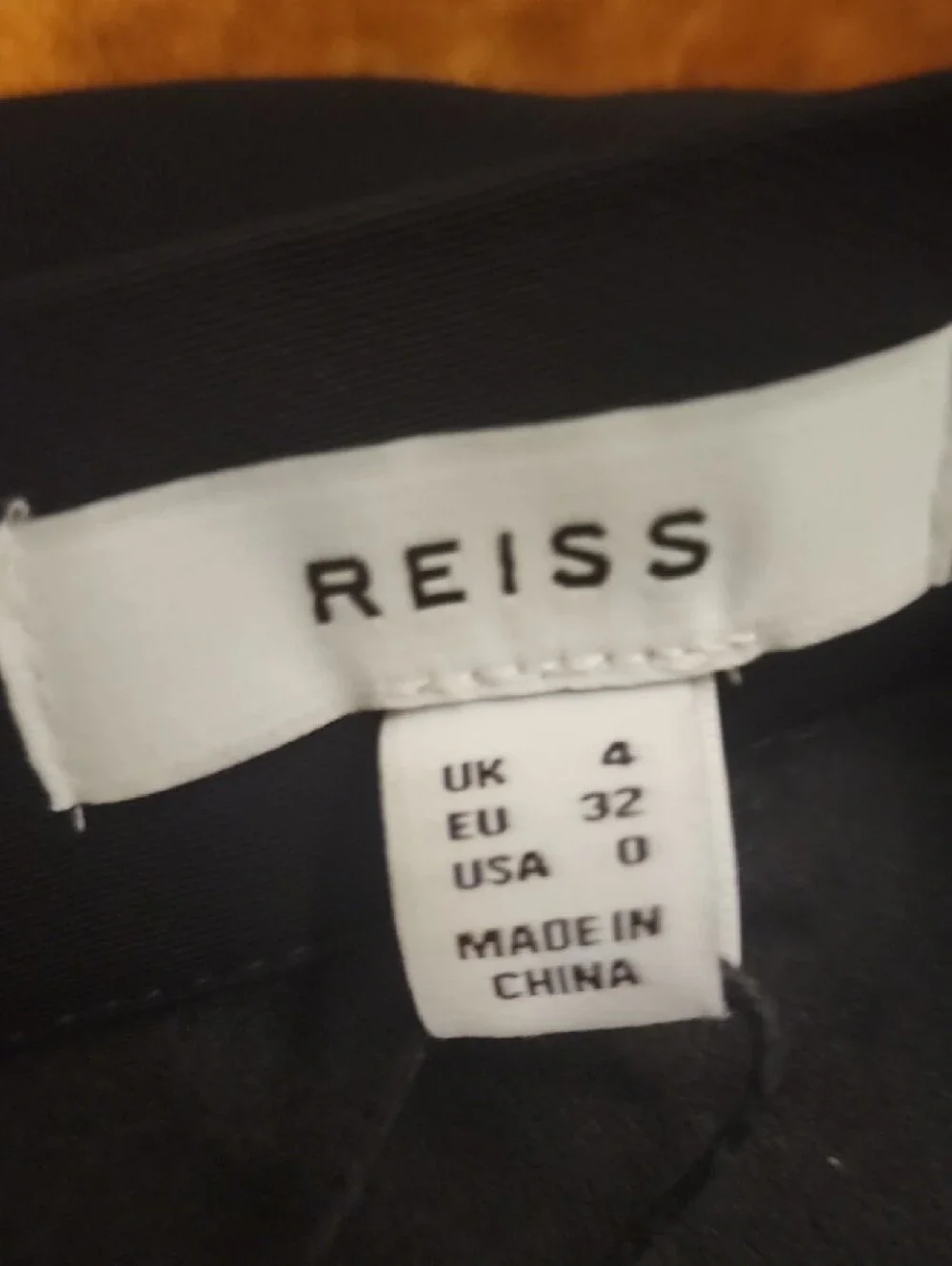 Reiss Black Mini Skirt with Curved Panel Detail